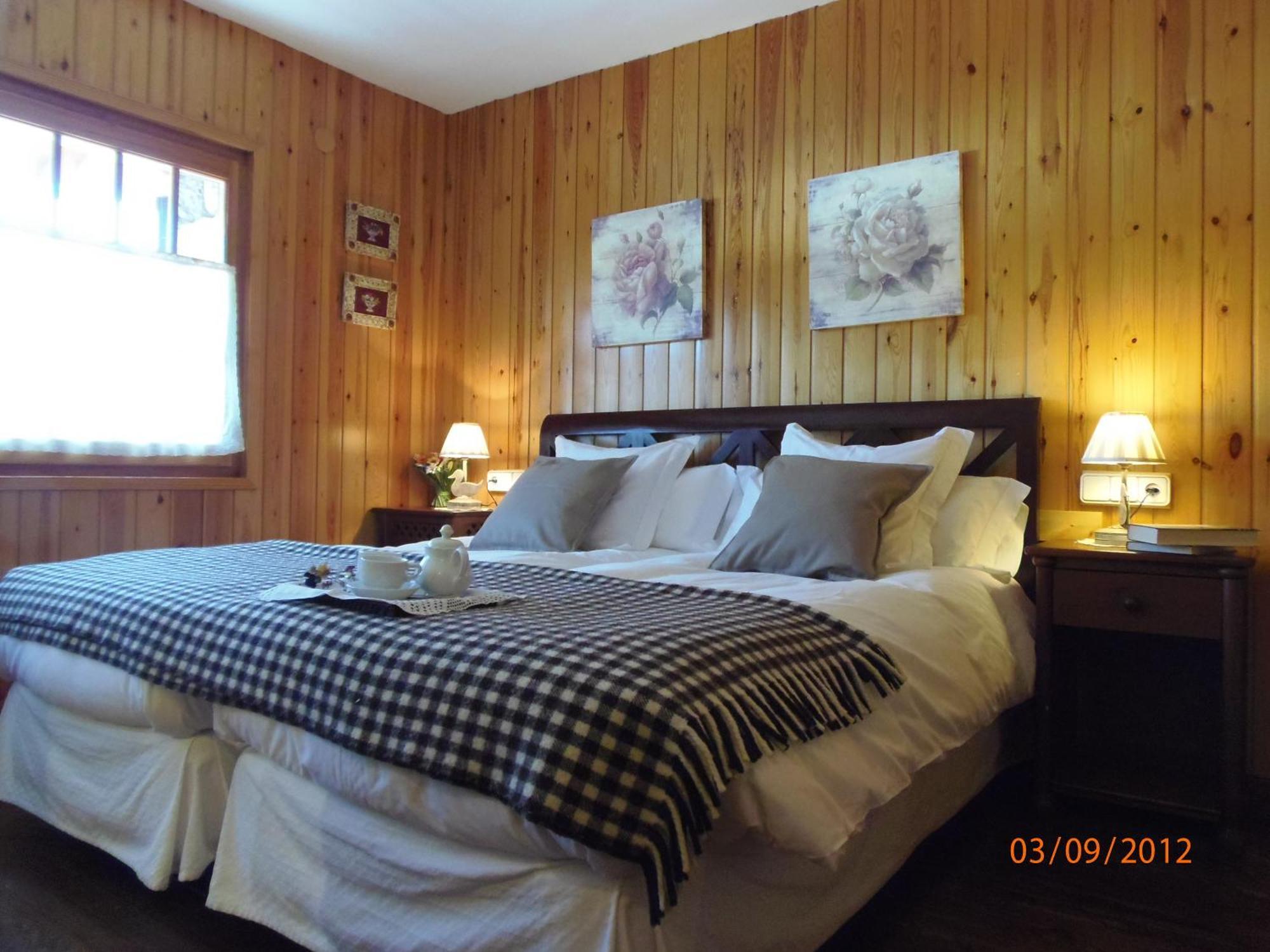 El Xalet De Tauell Hotel Rural Rom bilde